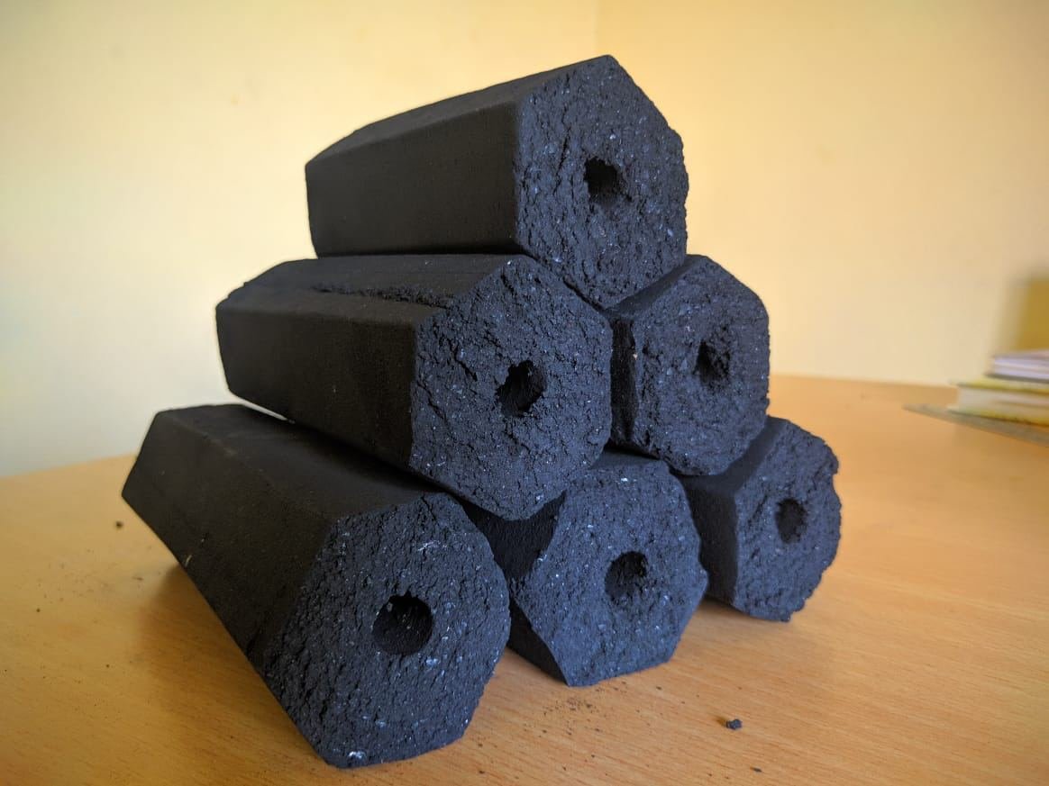 Charcoal briquettes hexagonal sticks with center hole